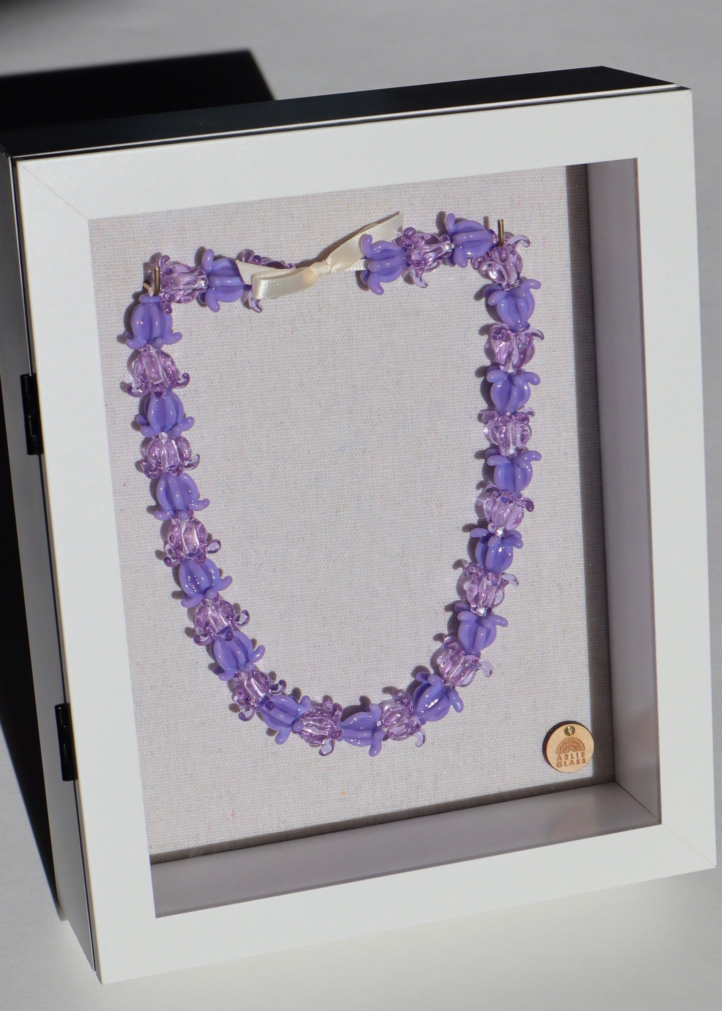 Pua Kalaunu Crown Flower Glass Lei in Shadowbox